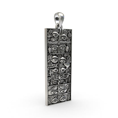 Handcrafted sterling silver Krishna eyes pendant in a slim vertical seven-panel design
